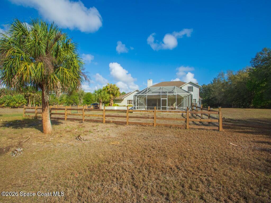 167 Deer Run Road Palm Bay, FL 32909 - Photo 33 of 36 a front view of a house with a yard