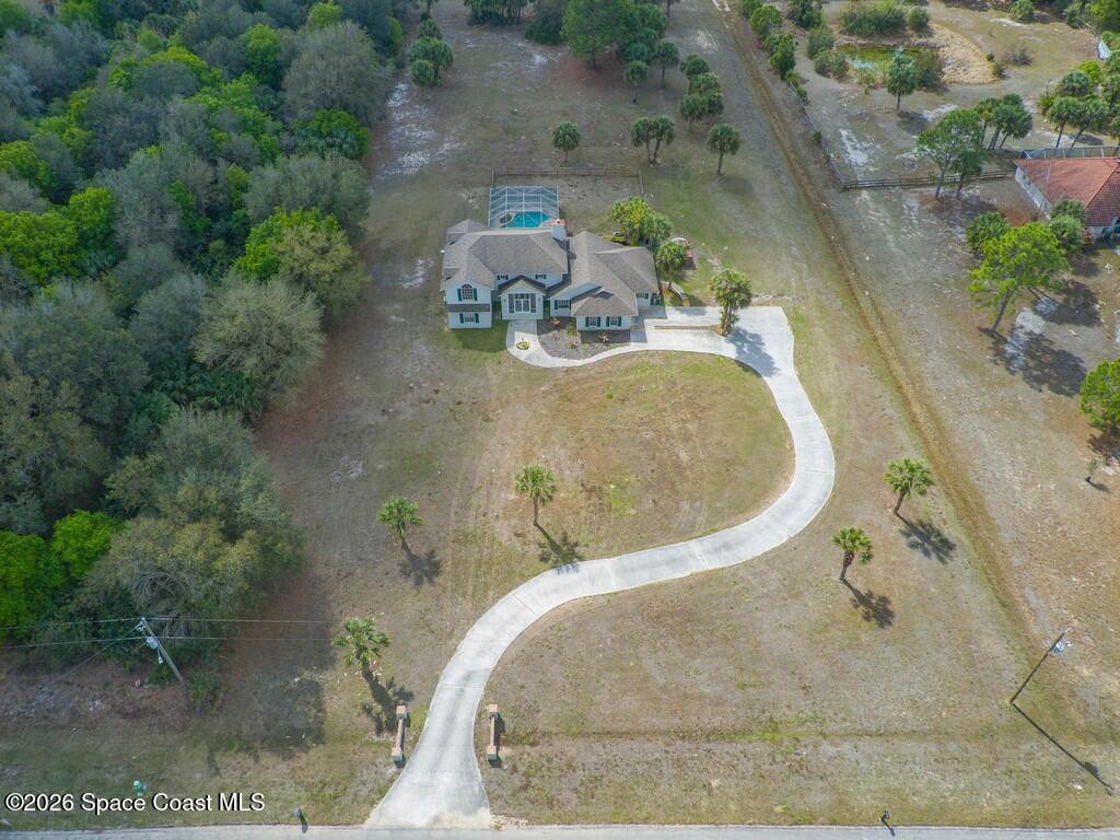 167 Deer Run Road Palm Bay, FL 32909 - Photo 36 of 36 an aerial view of a swimming pool