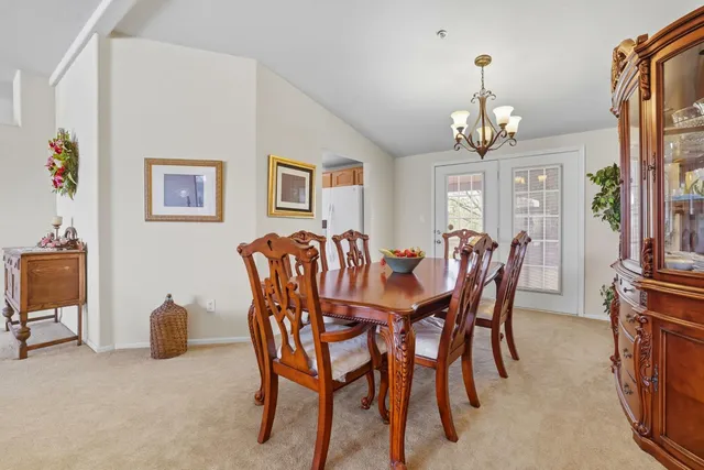 a kitchen that has a sink and a stove in it