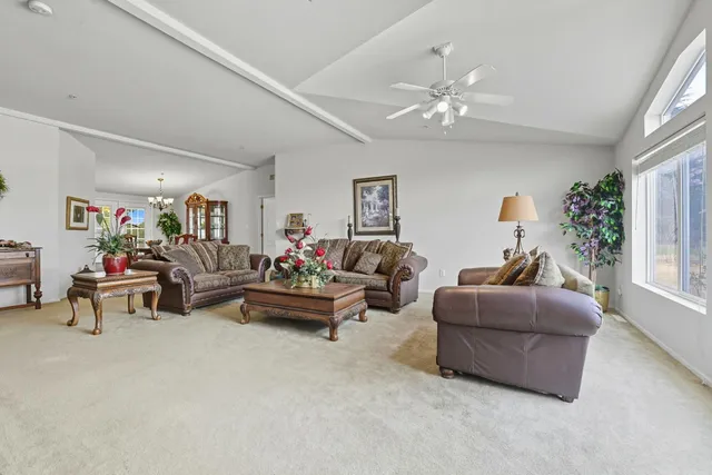 a bed room with a bed and a dresser