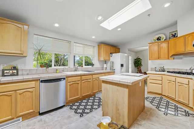 a view of outdoor space with deck and trees