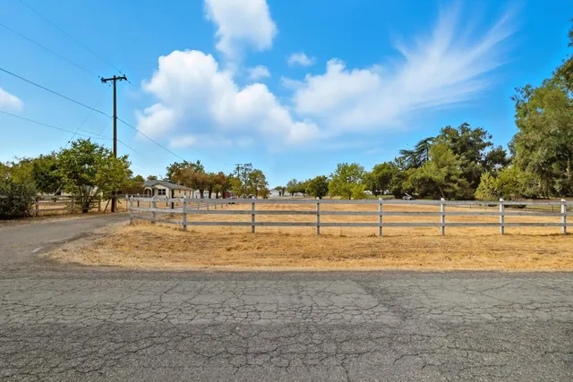 a bedroom with a large bed closet and a window