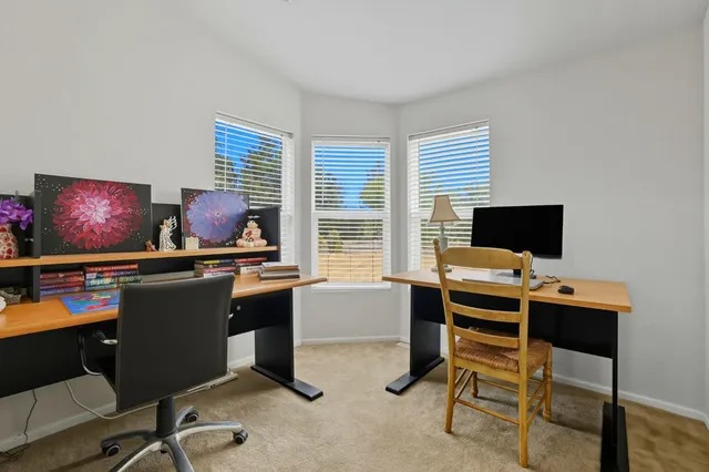 a view of outdoor space with deck and trees