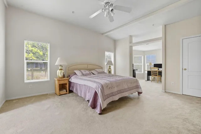 a view of a golf course with a lake