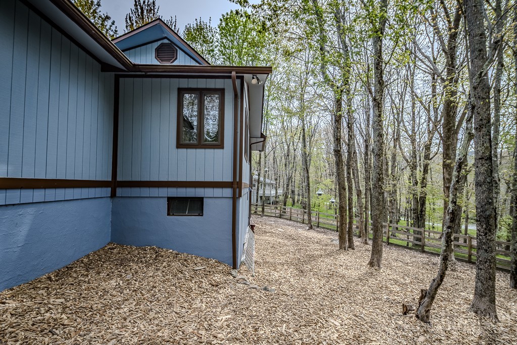 103-105 Upper Grouse Ridge Road Beech Mountain, NC 28604 - Photo 36 of 48 a house view with a outdoor space