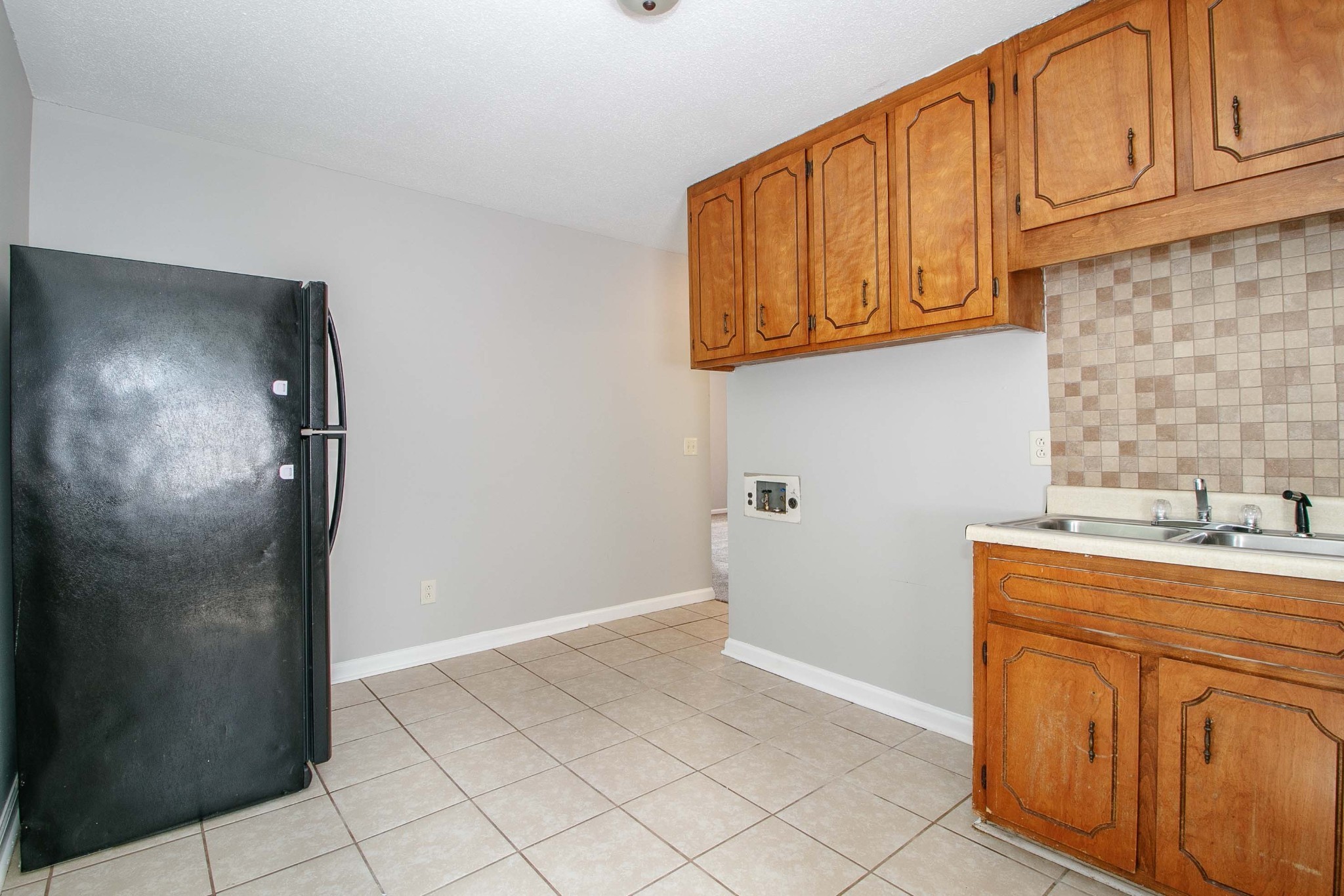 1088 Mcdaniel Road Clarksville, TN 37043 - Photo 20 of 71 a kitchen with stainless steel appliances granite countertop a refrigerator and a sink