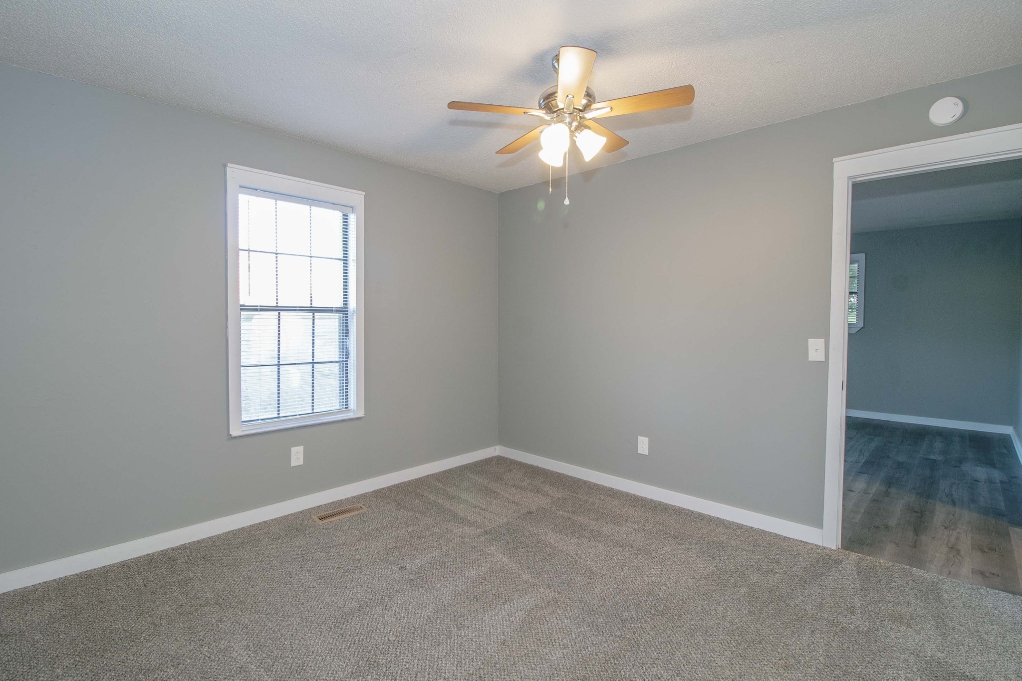 1088 Mcdaniel Road Clarksville, TN 37043 - Photo 47 of 71 an empty room with windows and fan