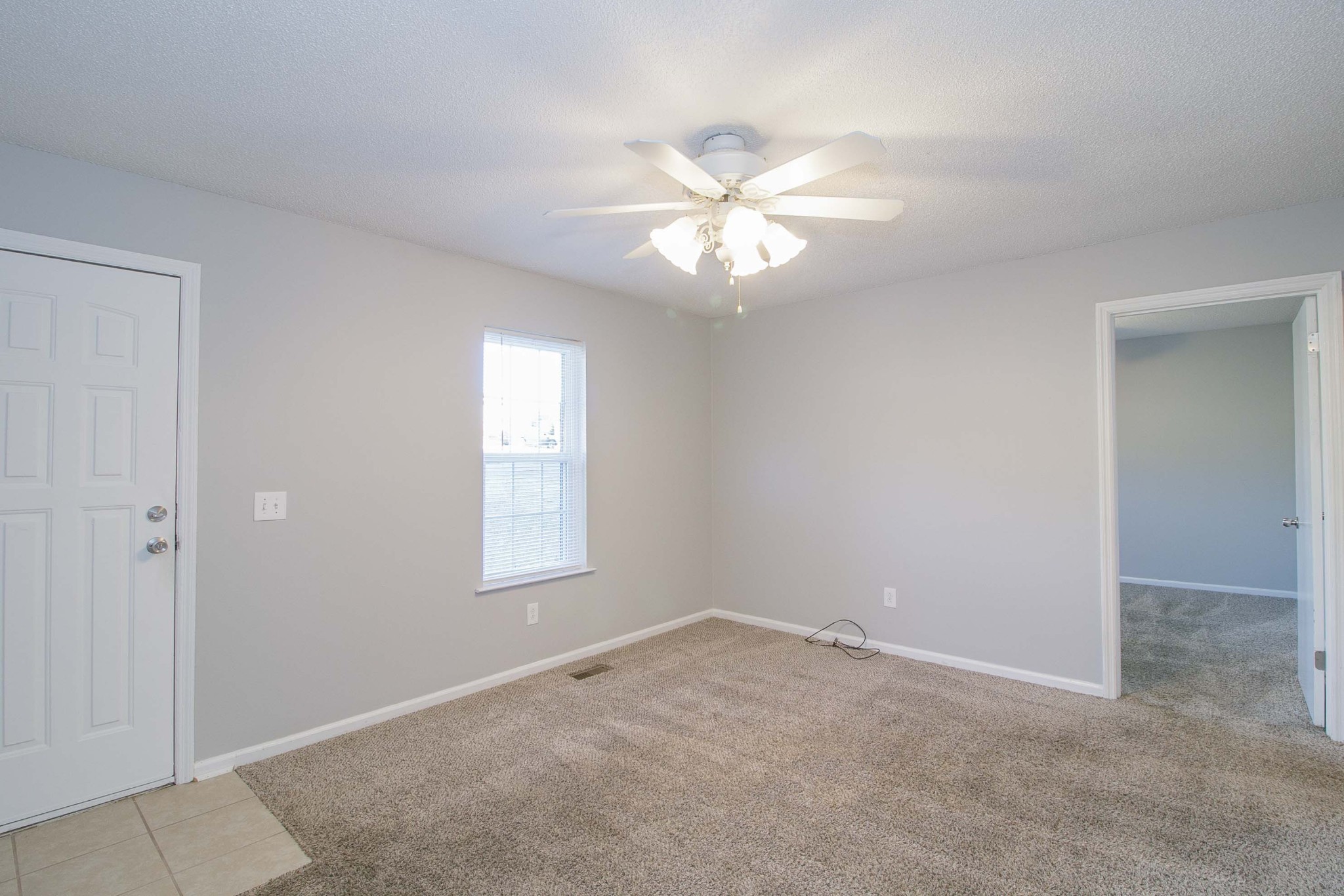 1088 Mcdaniel Road Clarksville, TN 37043 - Photo 55 of 71 an empty room with windows and fan
