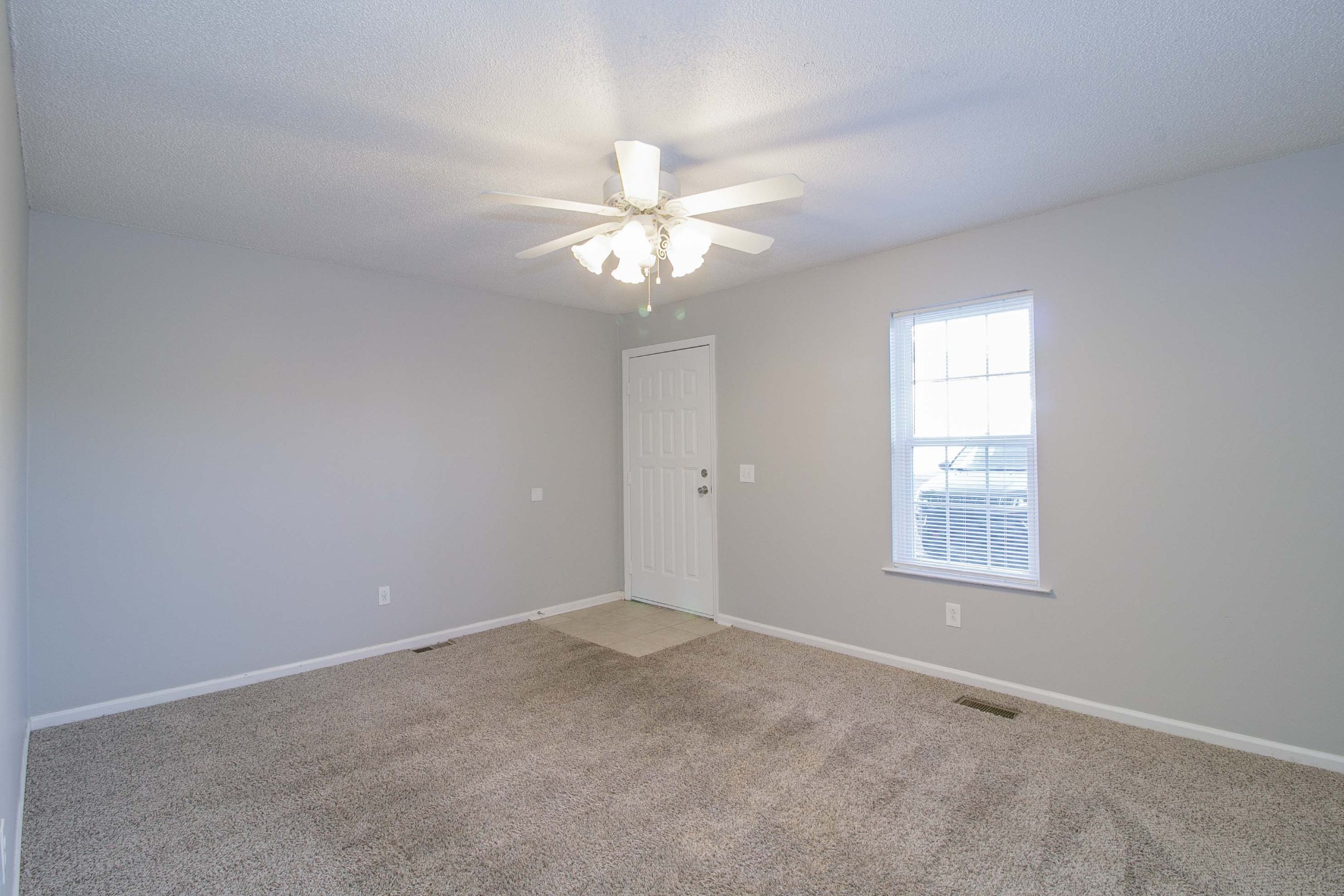 1088 Mcdaniel Road Clarksville, TN 37043 - Photo 57 of 71 an empty room with windows and fan