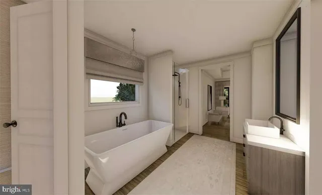 a en suite bathroom with a sink and a mirror