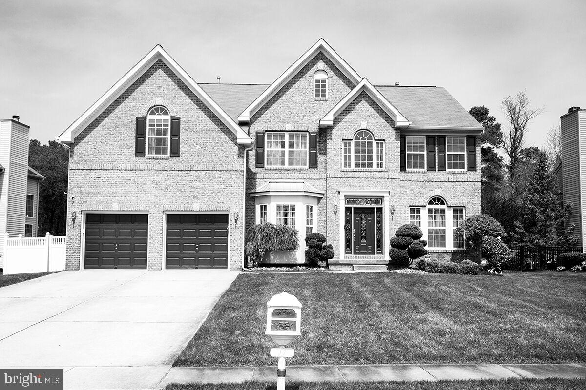 Exterior Front: Brick Front. F/B Lawn Sprinklers