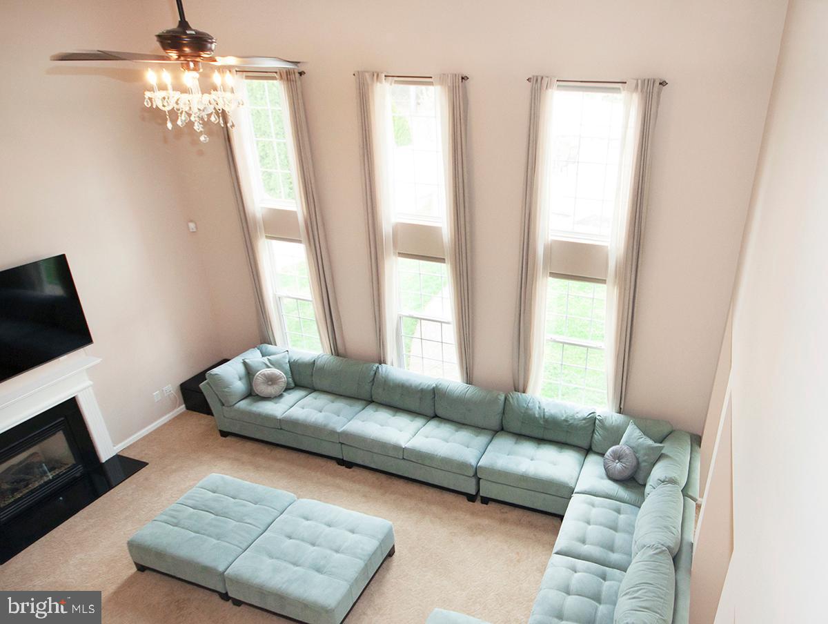 17 Ragan Ridge Road Sicklerville, NJ 08081 - Photo 17 of 57 Family Room: 20 Foot Ceiling: Wall of Windows
