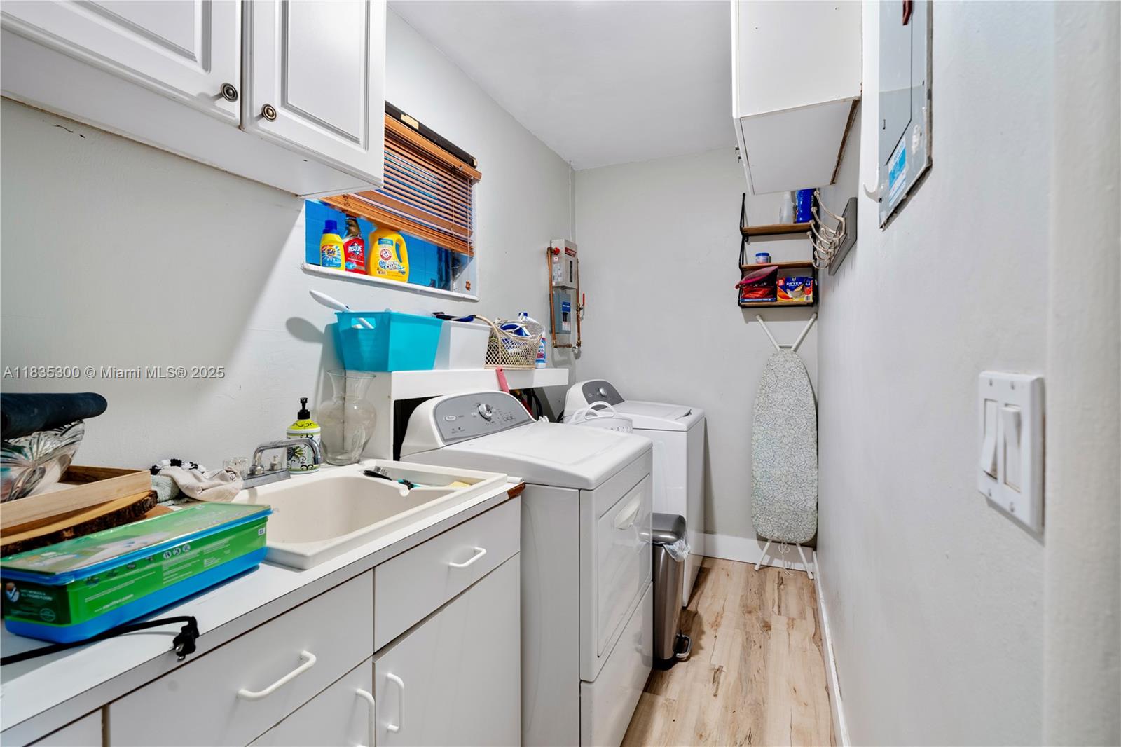 4025 Washington Street Hollywood, FL 33021 - Photo 15 of 24 a room with storage and utility