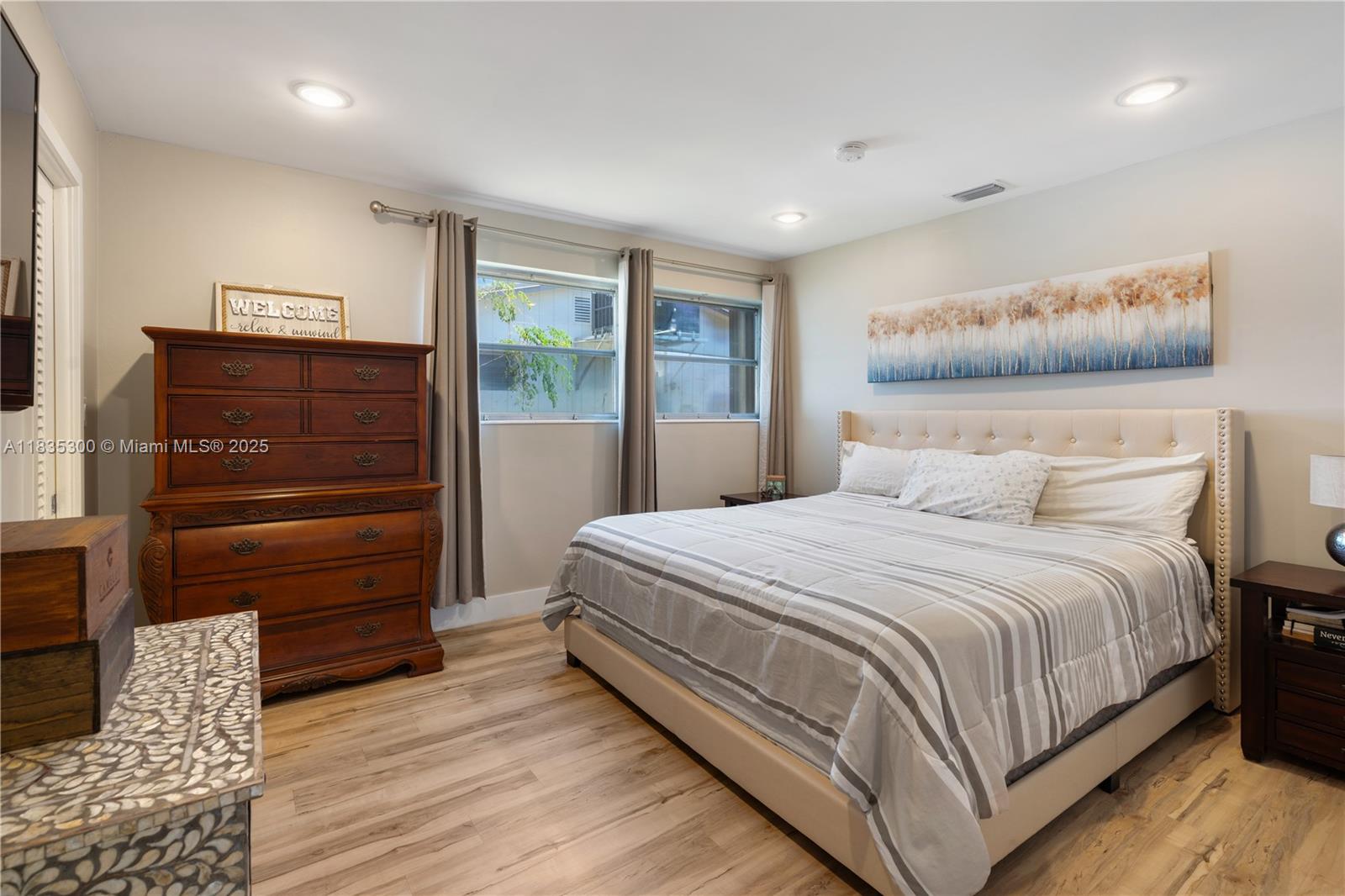 4025 Washington Street Hollywood, FL 33021 - Photo 9 of 24 a bedroom with a bed and a dresser