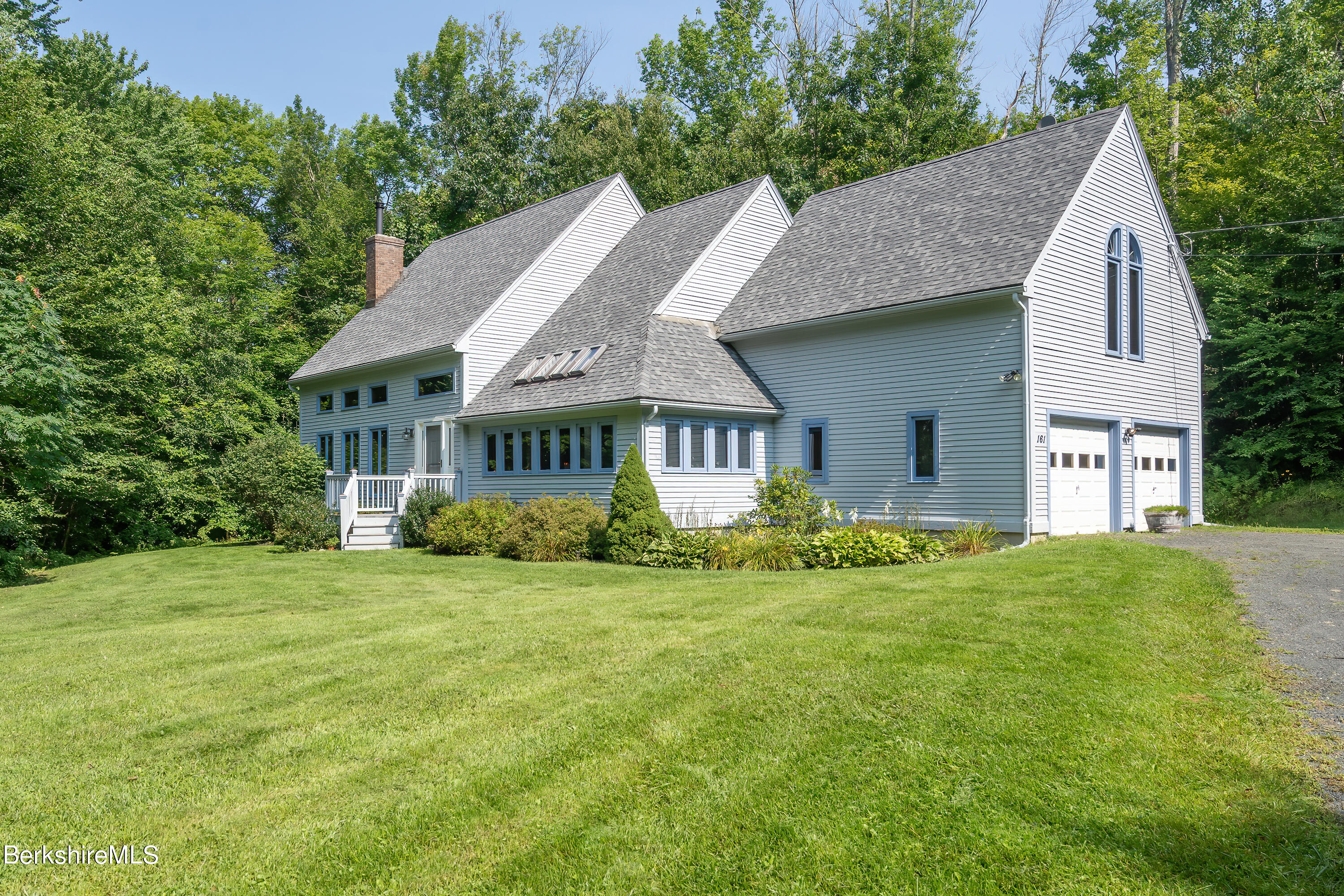 161 Capt Whitney Road Becket, MA 01223 - Photo 1 of 29 a view of a house with a yard