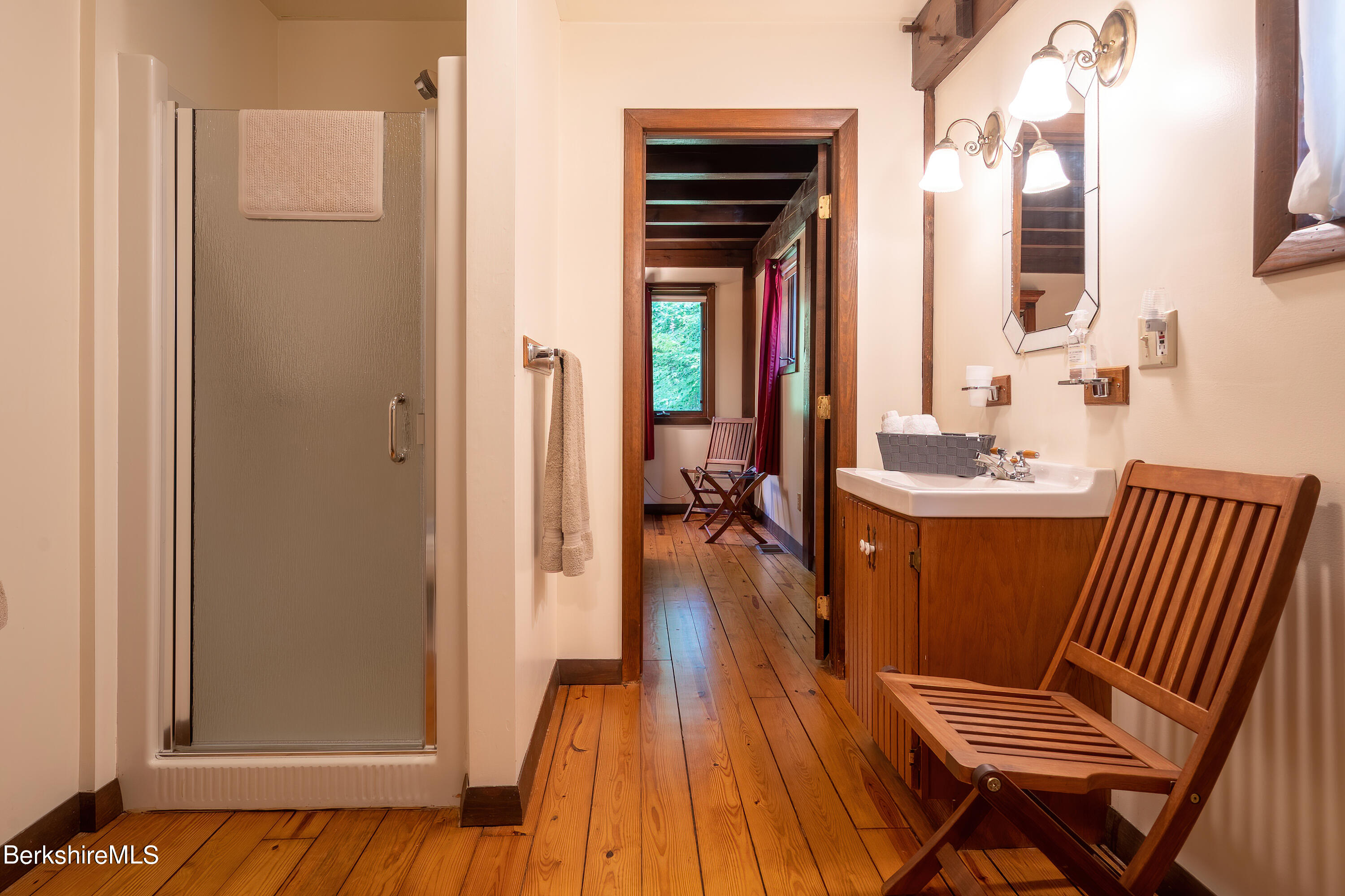 161 Capt Whitney Road Becket, MA 01223 - Photo 16 of 29 a very nice looking room with a wooden floor