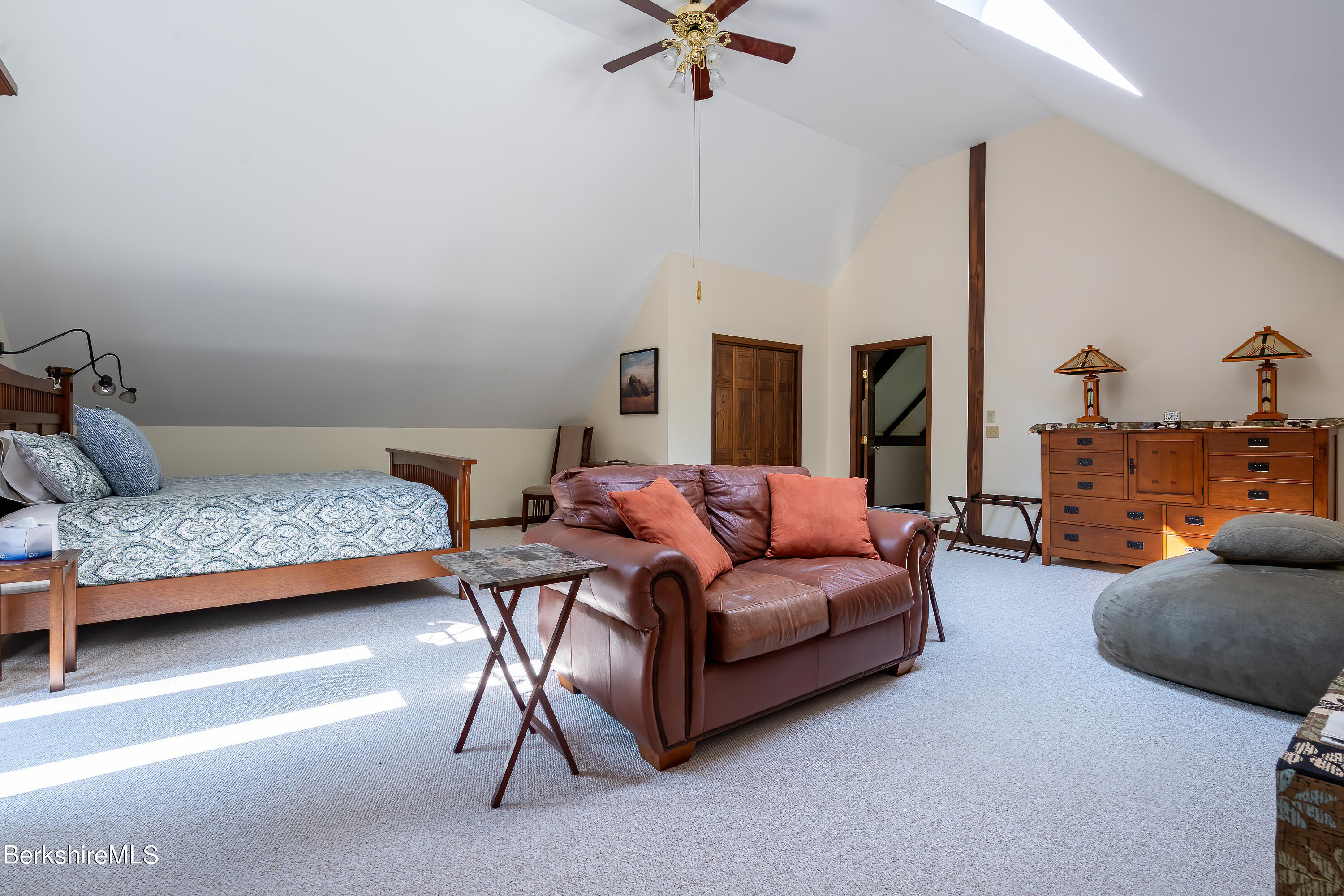 161 Capt Whitney Road Becket, MA 01223 - Photo 20 of 29 a living room with furniture and a couch