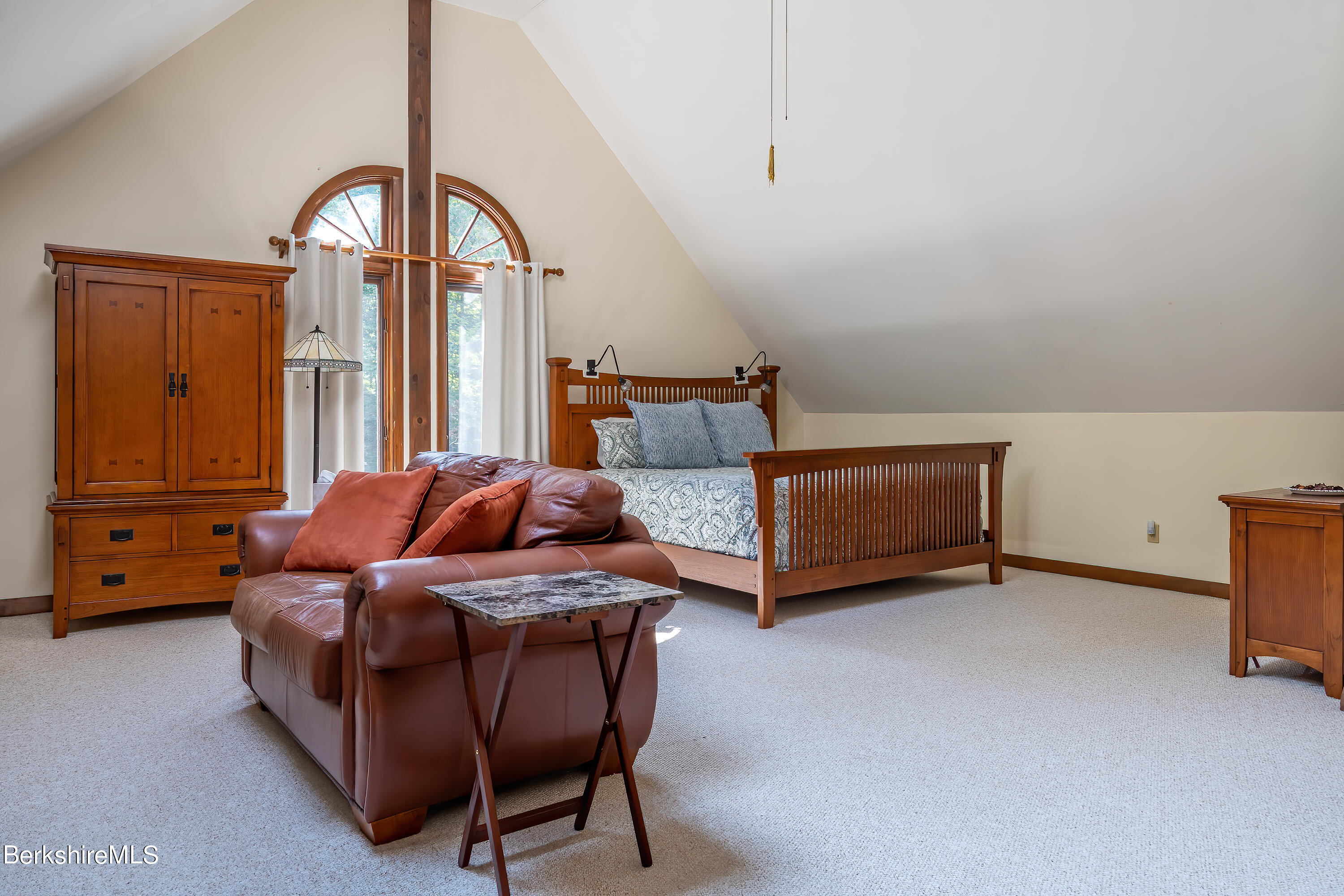 161 Capt Whitney Road Becket, MA 01223 - Photo 21 of 29 a bedroom with a bed and a window