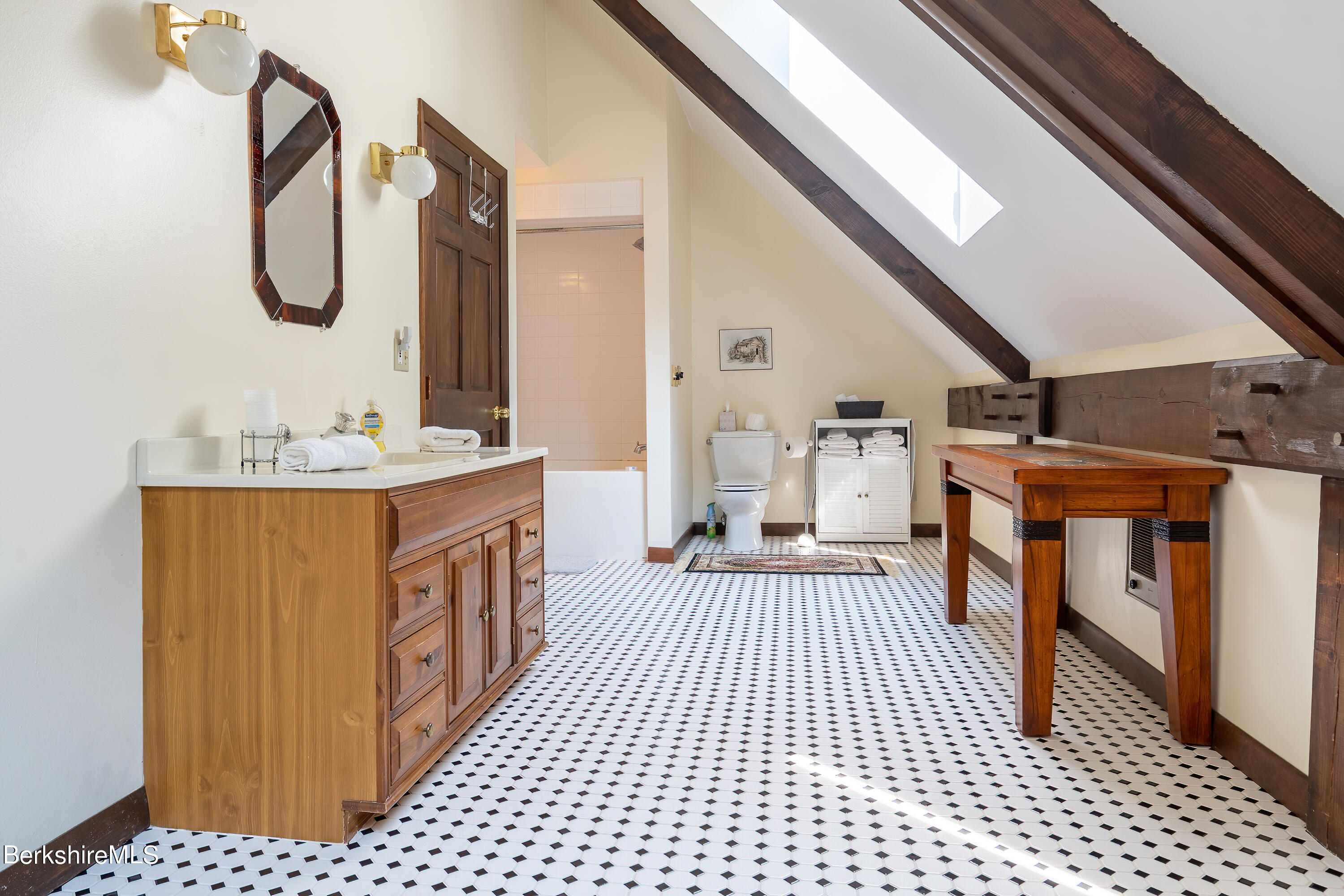161 Capt Whitney Road Becket, MA 01223 - Photo 23 of 29 a bathroom with a sink a mirror and shower