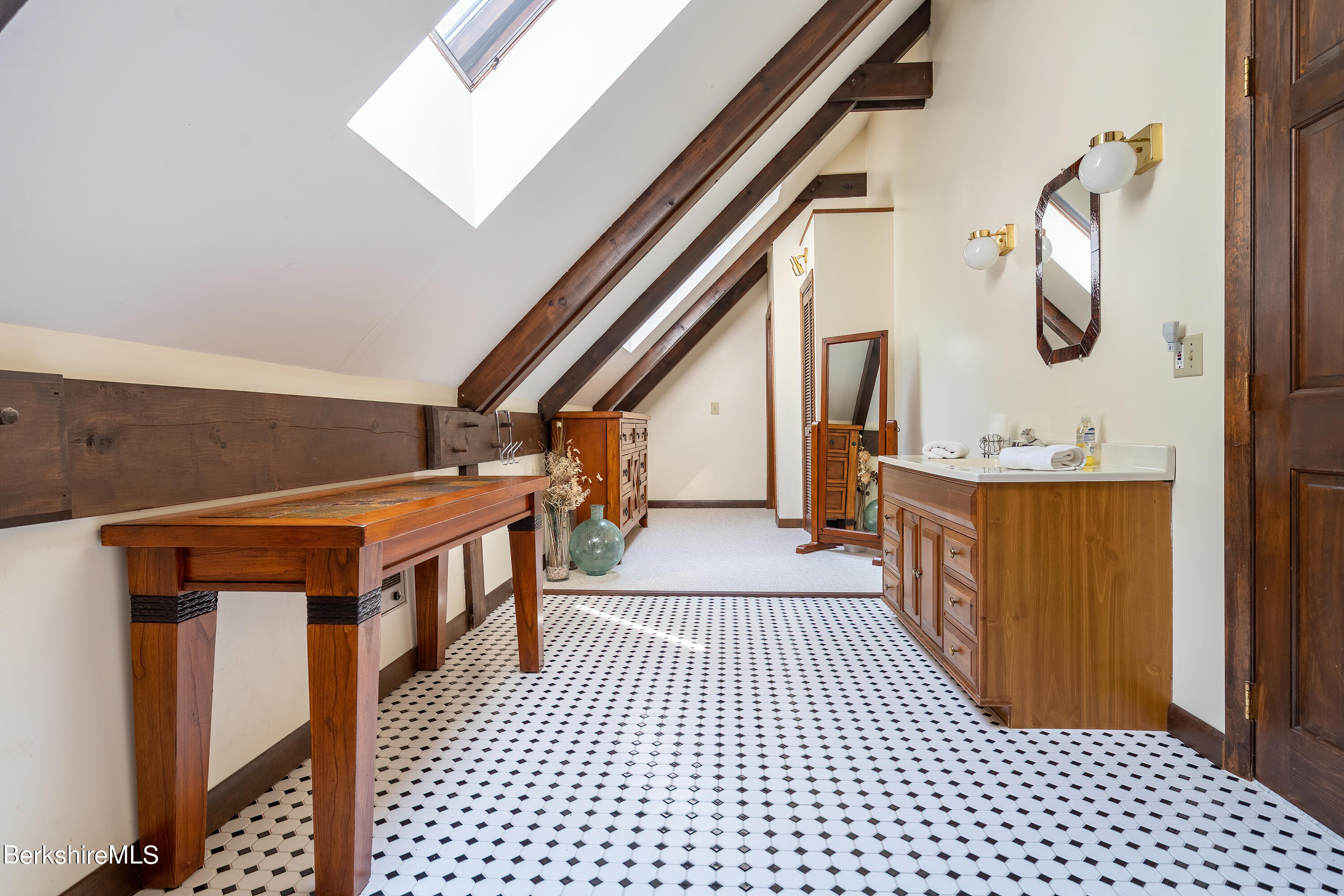 161 Capt Whitney Road Becket, MA 01223 - Photo 24 of 29 a hall way with furniture a mirror and stairs