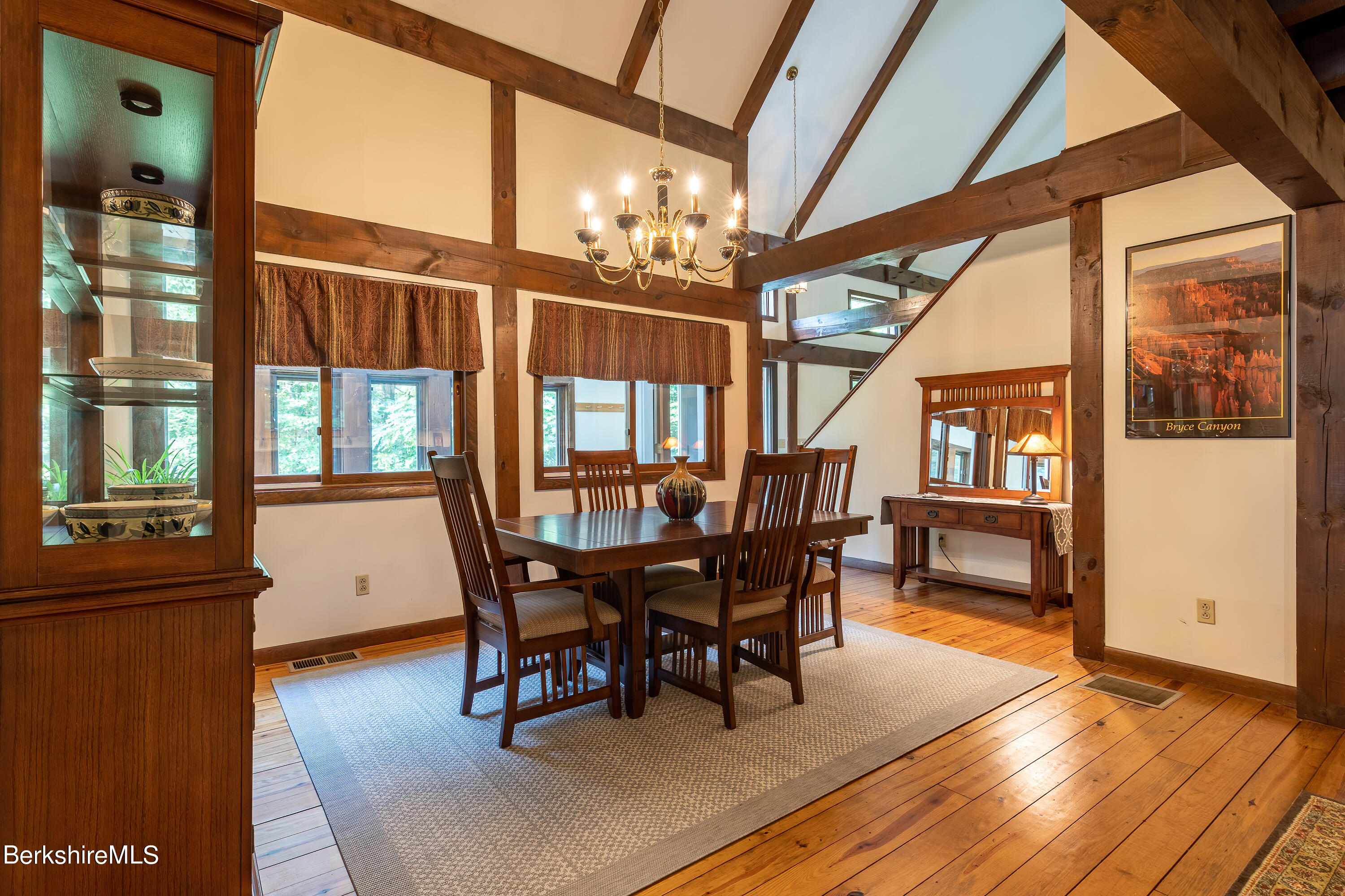 161 Capt Whitney Road Becket, MA 01223 - Photo 6 of 29 a view of a dining room with furniture window and wooden floor