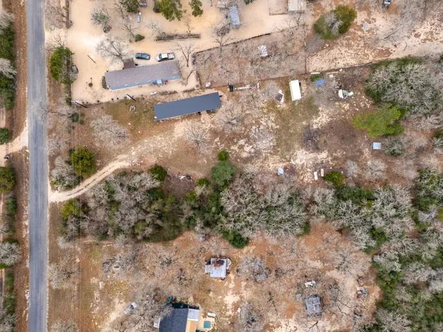 a view of outdoor space with trees all around