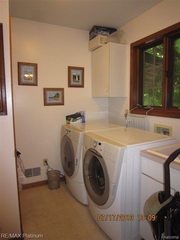 4203 North Latson Road Howell, MI 48855 - Photo 11 of 34 LATSON RD LAUNDRY