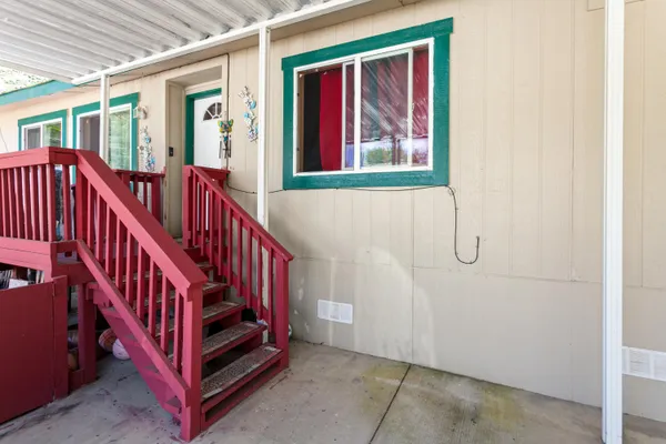 a view of a hallway with staircase