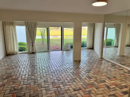 a view of empty room with windows