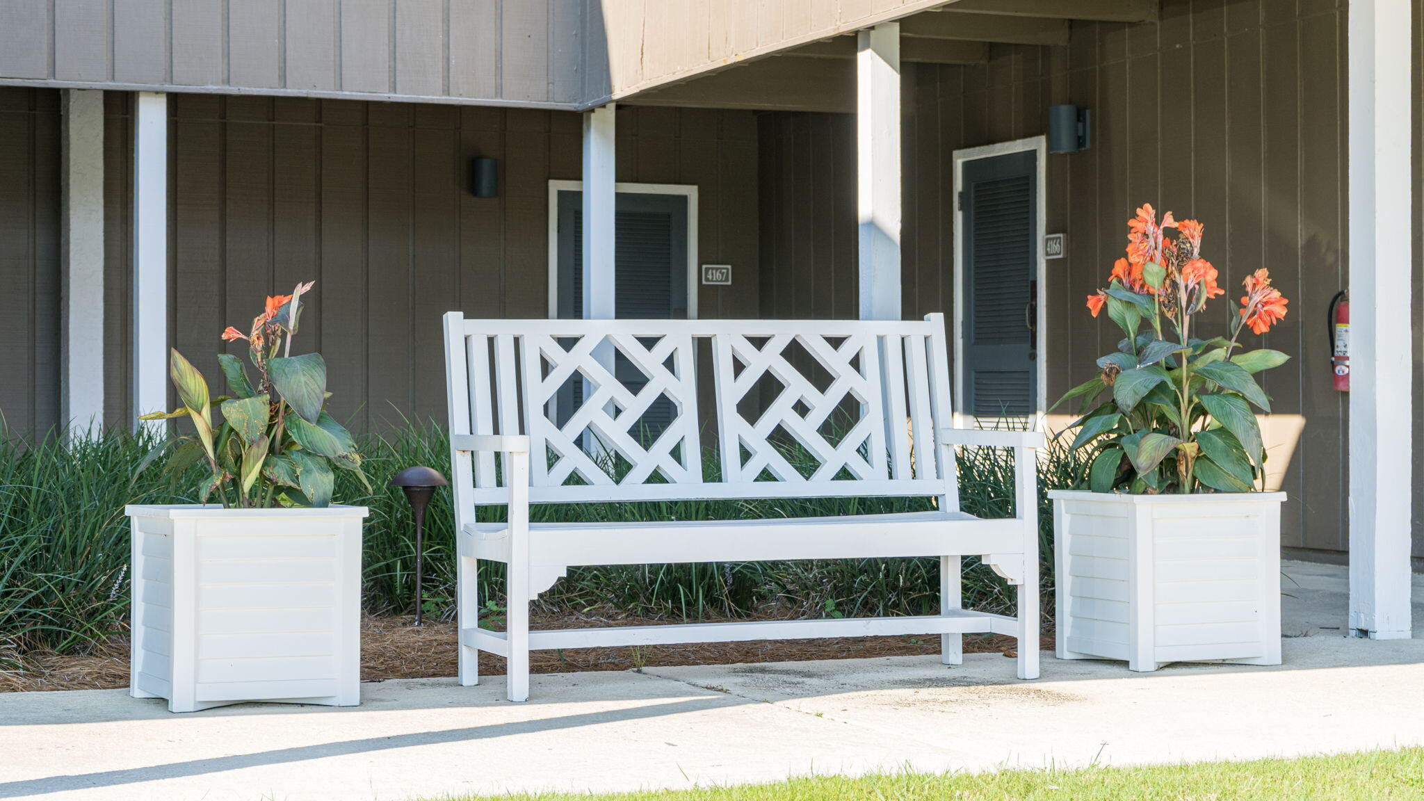 4725 Bay Point Road, Unit 166 Panama City Beach, FL 32408 - Photo 23 of 24 a white building with sign broad