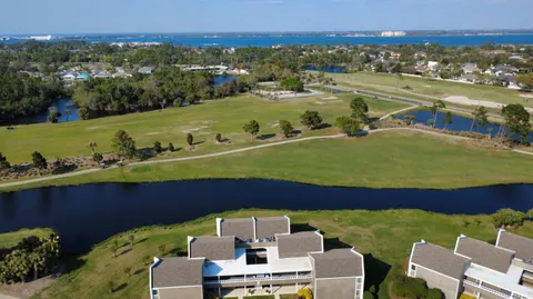 an aerial view of a houses with outdoor space