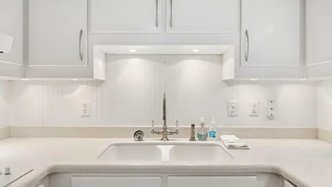 a bathroom with a sink and a bathtub