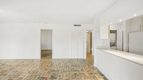 a bathroom with a sink and a shower