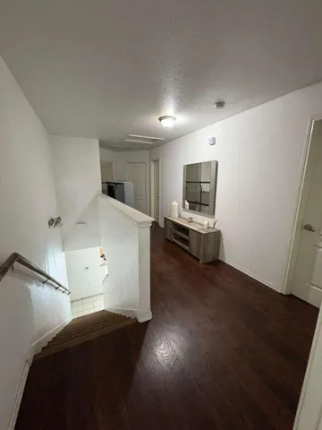 a view of kitchen and wooden floor