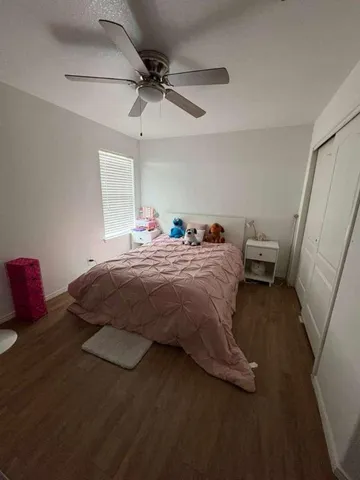 a bedroom with a bed and furniture