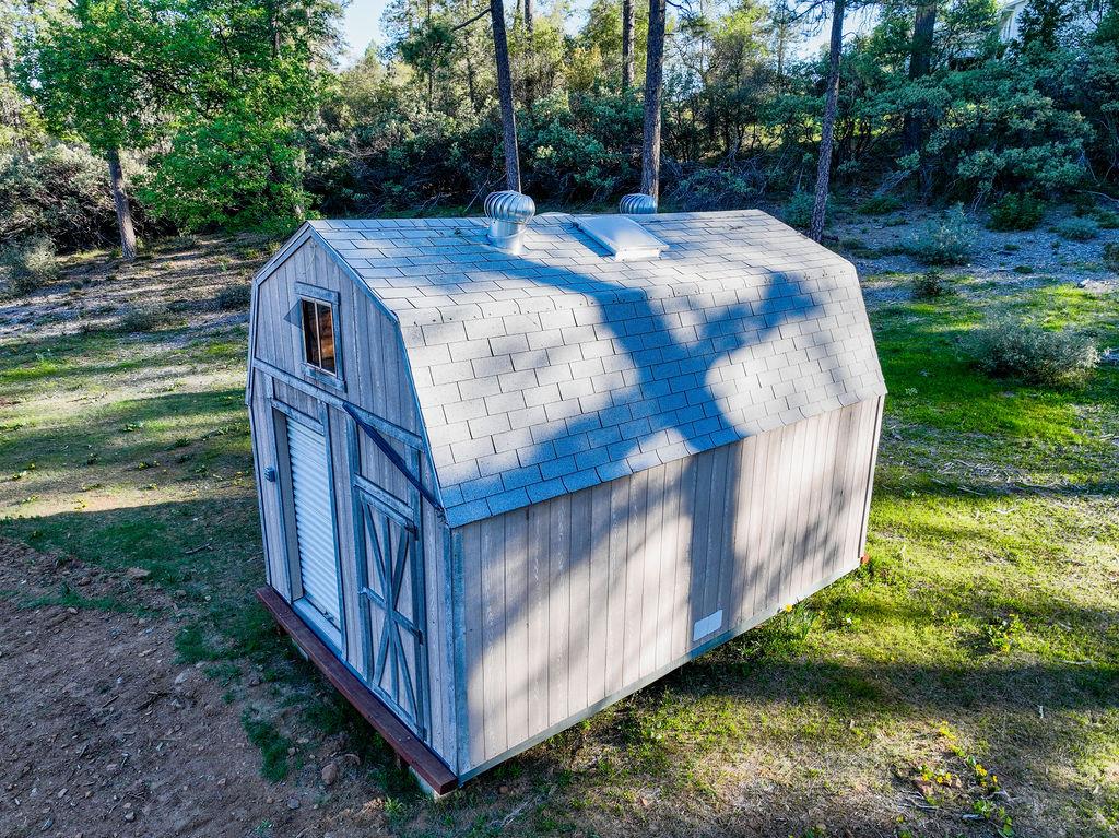 13279 Thoroughbred Loop Grass Valley, CA 95949 - Photo 8 of 33 a view of a backyard with barn