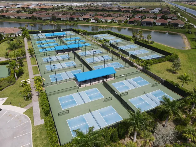 an aerial view of a houses with outdoor space