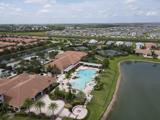 an aerial view of a houses with outdoor space