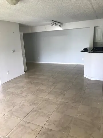 a view of a kitchen with a sink