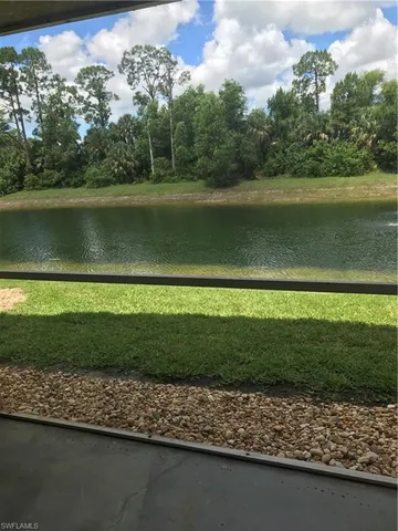 a view of a lake with a houses