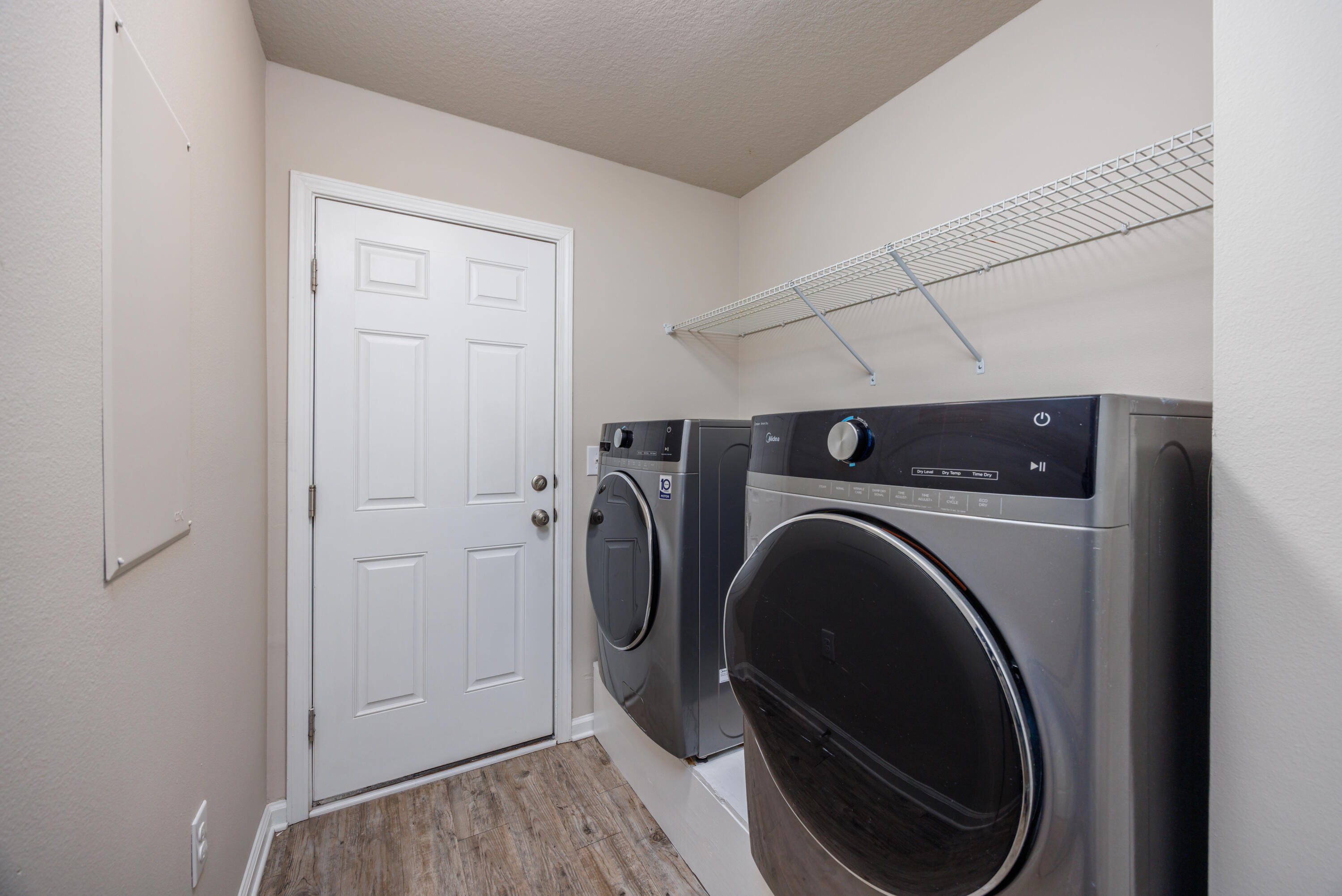 617 Fanny Ann Way Freeport, FL 32439 - Photo 12 of 21 a view of a storage & utility room with washer and dryer