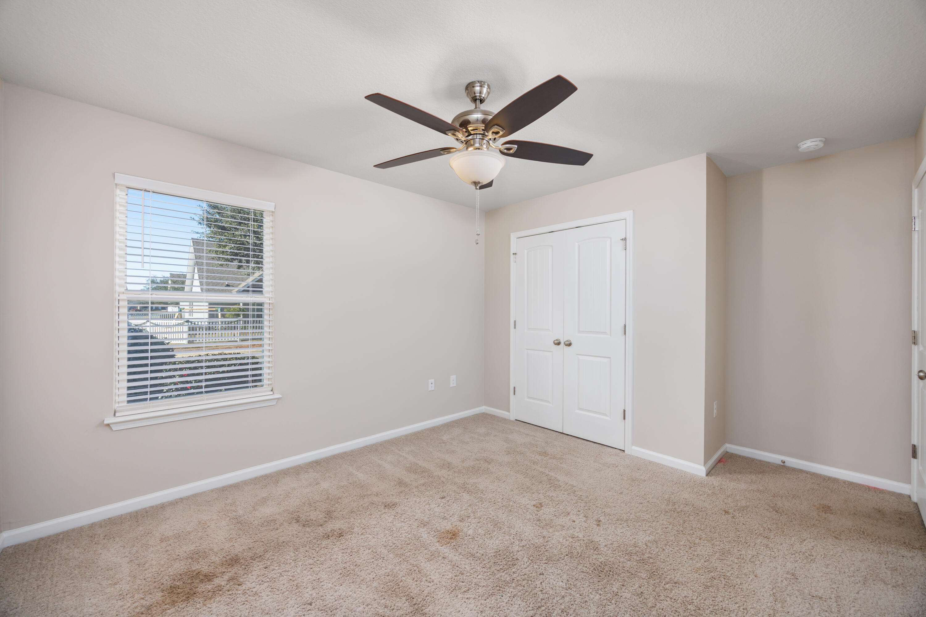 617 Fanny Ann Way Freeport, FL 32439 - Photo 13 of 21 a view of an empty room with a window