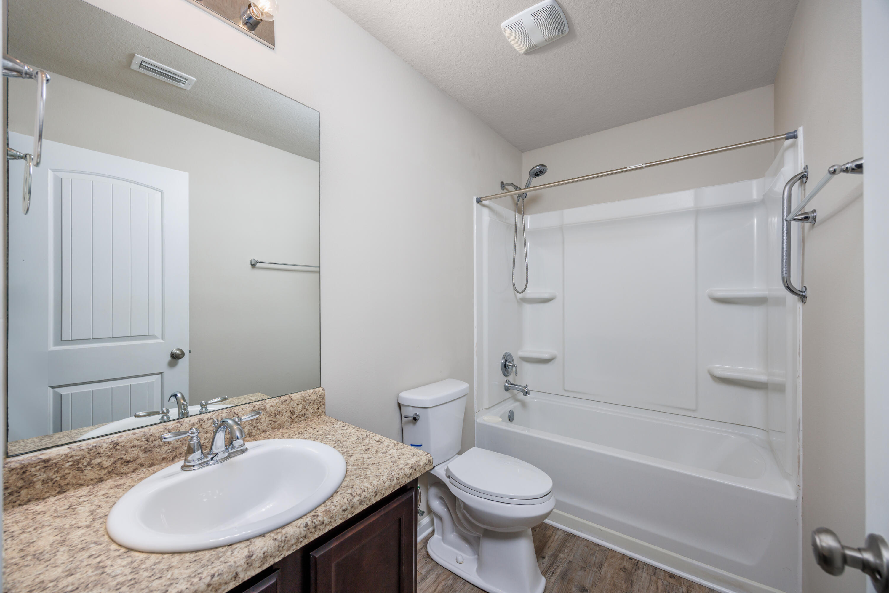 617 Fanny Ann Way Freeport, FL 32439 - Photo 14 of 21 a bathroom with a sink toilet tub vanity and shower