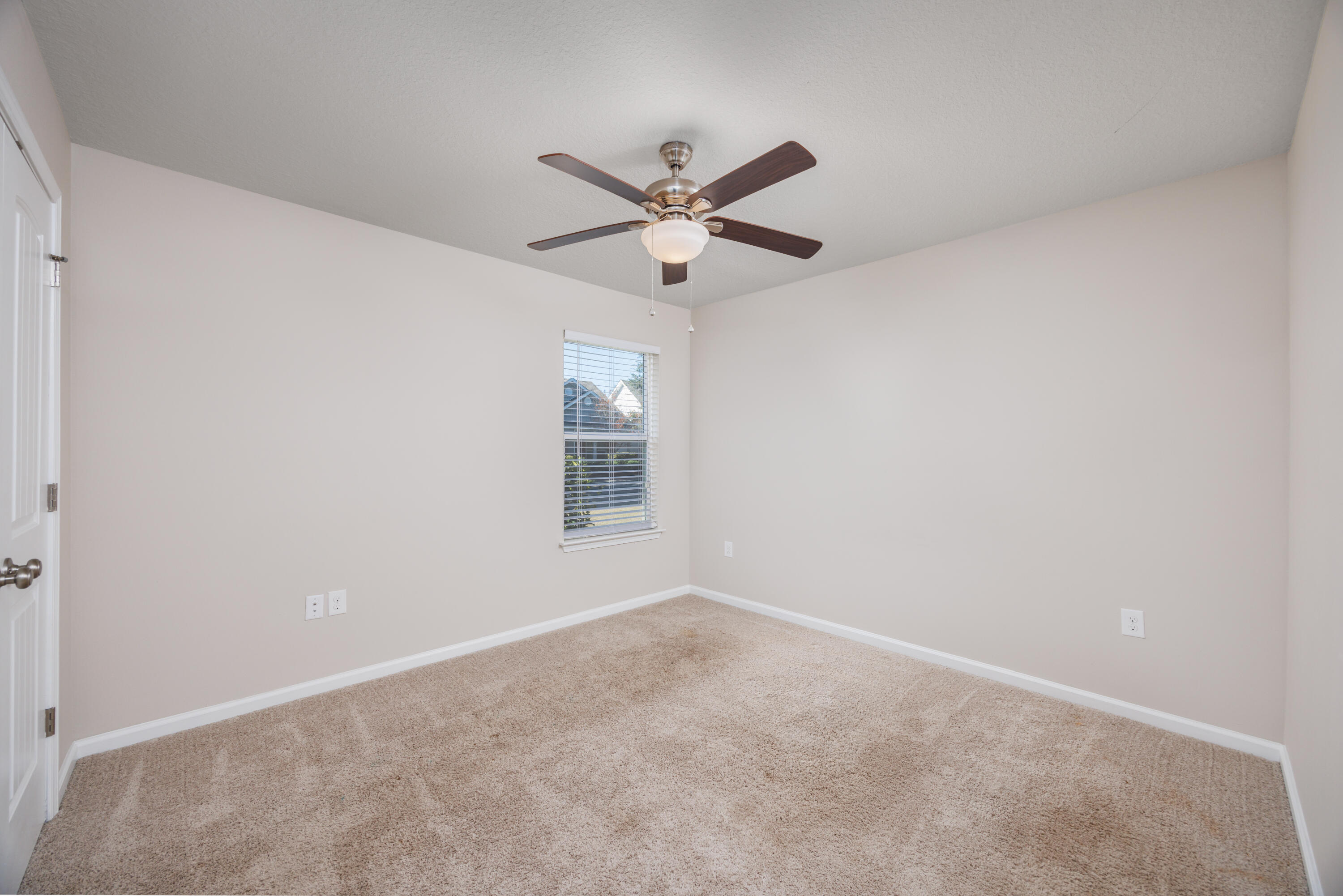 617 Fanny Ann Way Freeport, FL 32439 - Photo 15 of 21 an empty room with a window and a fan