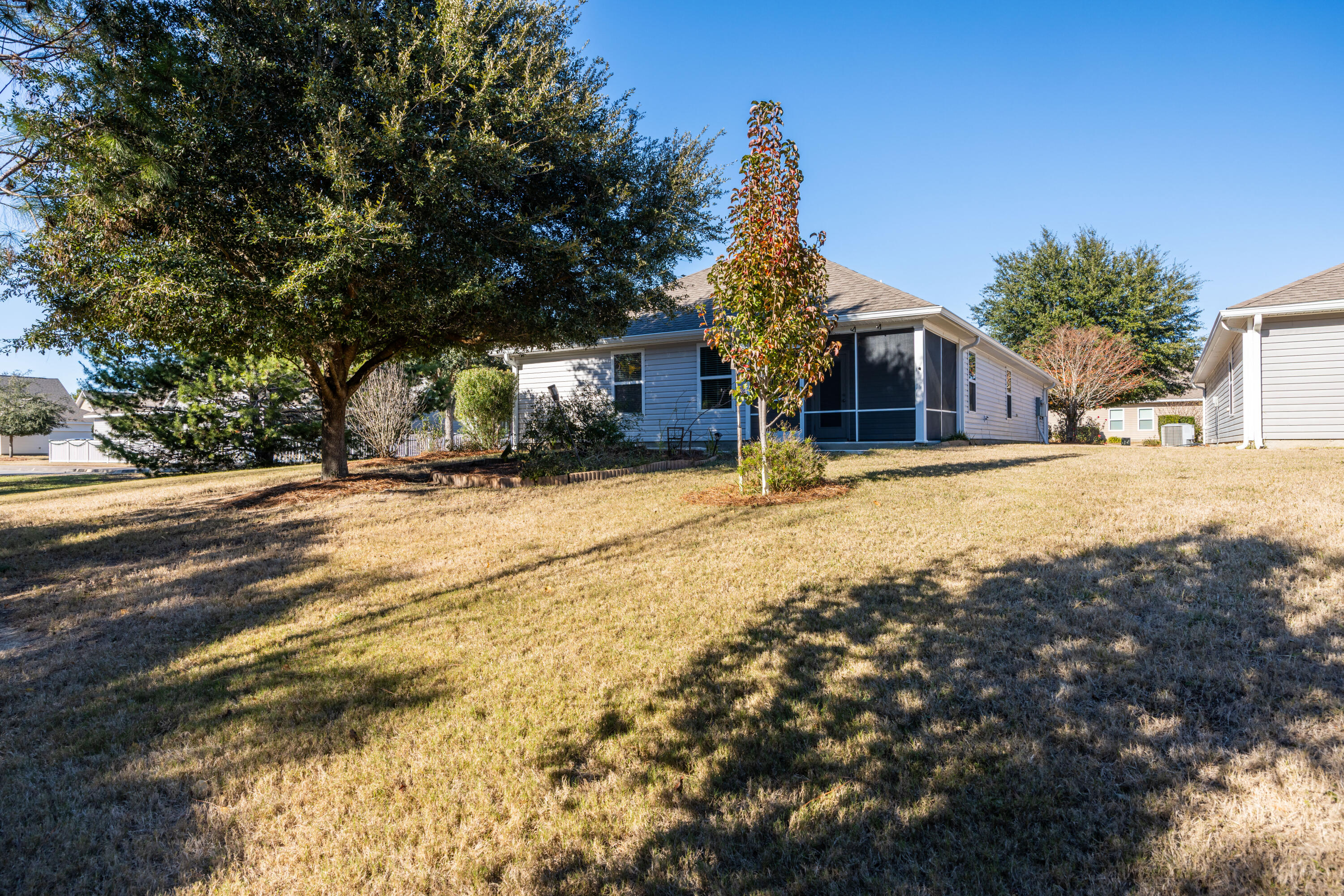 617 Fanny Ann Way Freeport, FL 32439 - Photo 20 of 21 a view of a road with a house in the background