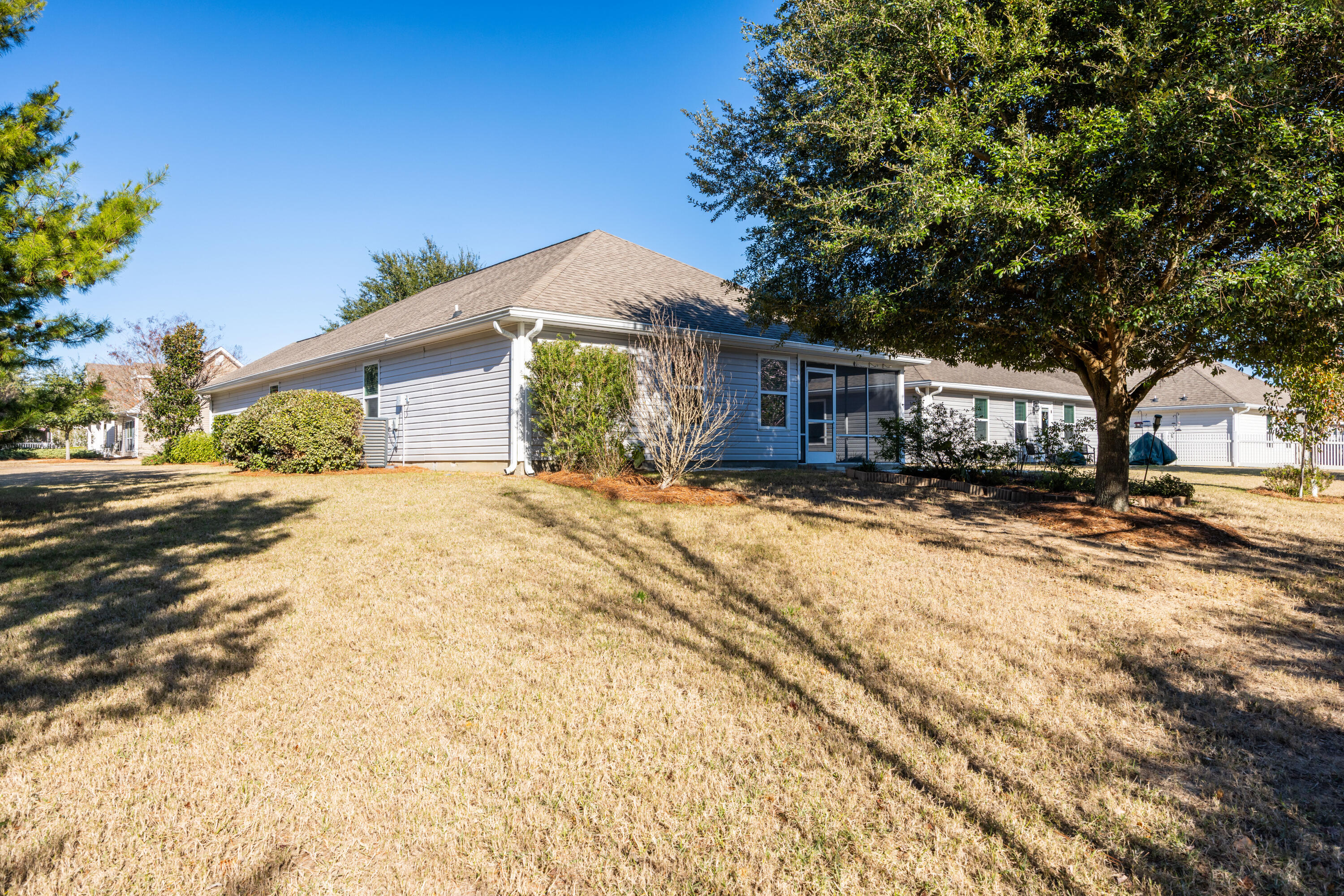 617 Fanny Ann Way Freeport, FL 32439 - Photo 21 of 21 a front view of a house with a yard