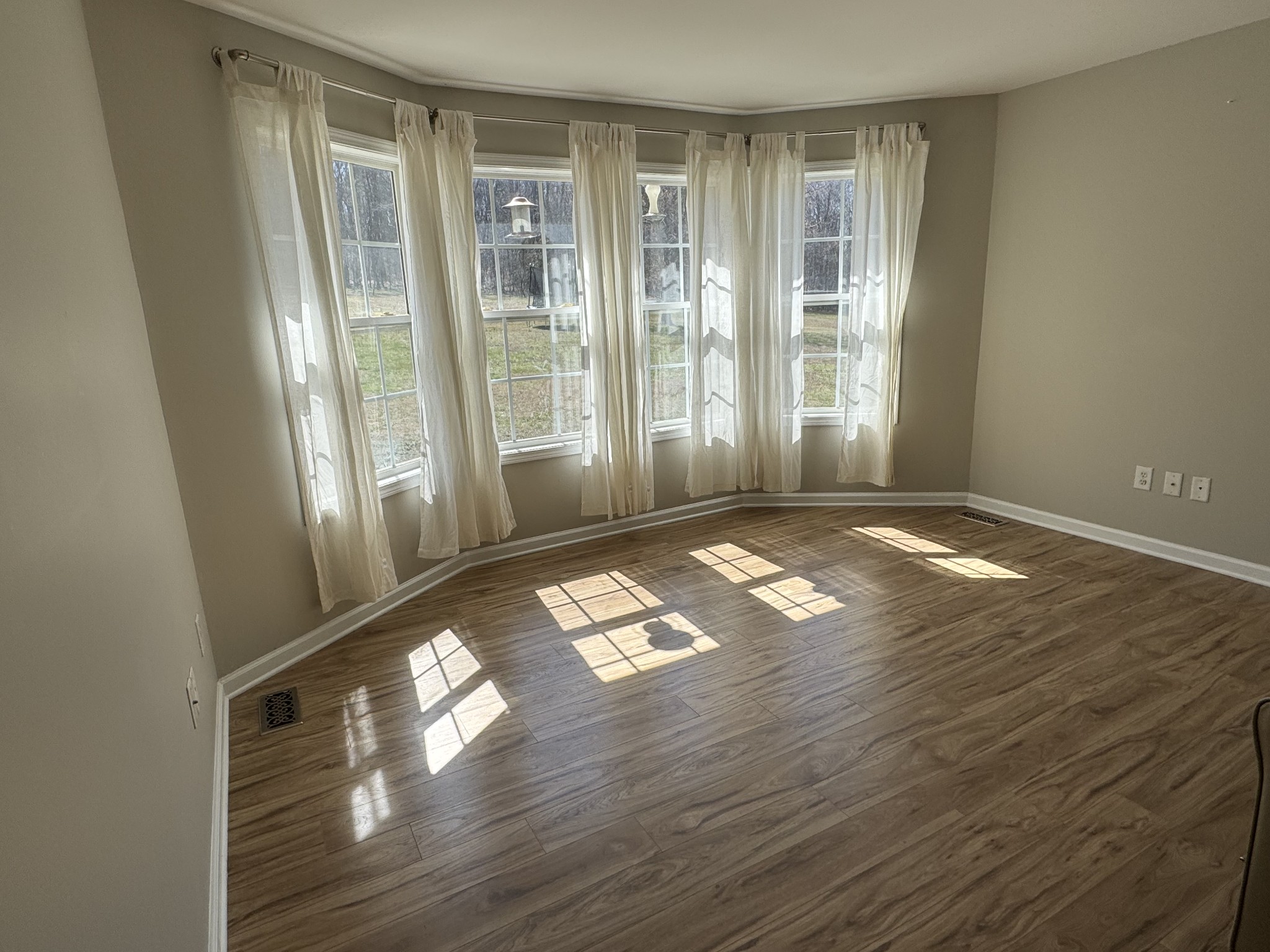 523 D V Circle Spring Hill, TN 37174 - Photo 6 of 10 a view of empty room with wooden floor