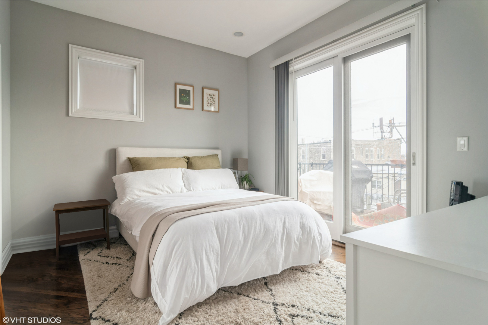 2013 West Rice Street, Unit 3 Chicago, IL 60622 - Photo 6 of 13 a bedroom with a large bed and a large window