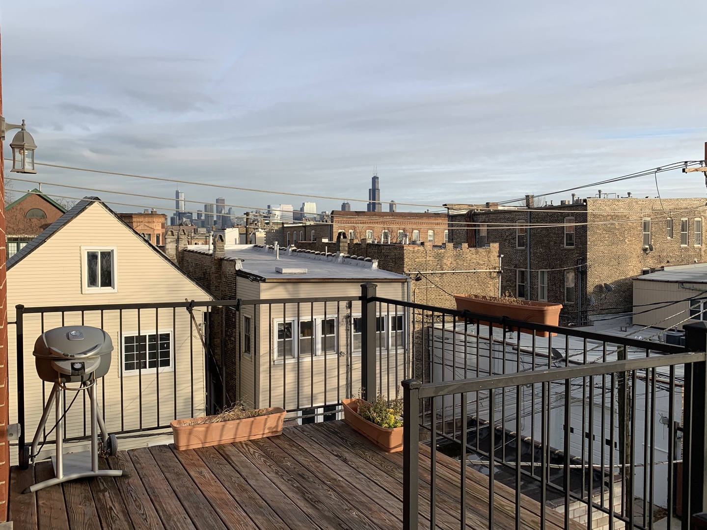 2013 West Rice Street, Unit 3 Chicago, IL 60622 - Photo 10 of 13 a view of a balcony with wooden floor