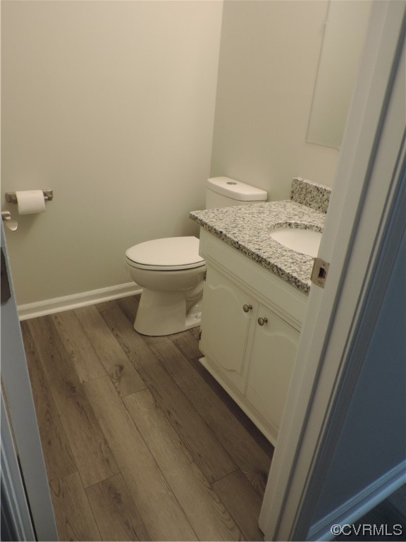 10616 Savoy Road North Chesterfield, VA 23235 - Photo 11 of 29 a bathroom with a granite countertop toilet and a sink